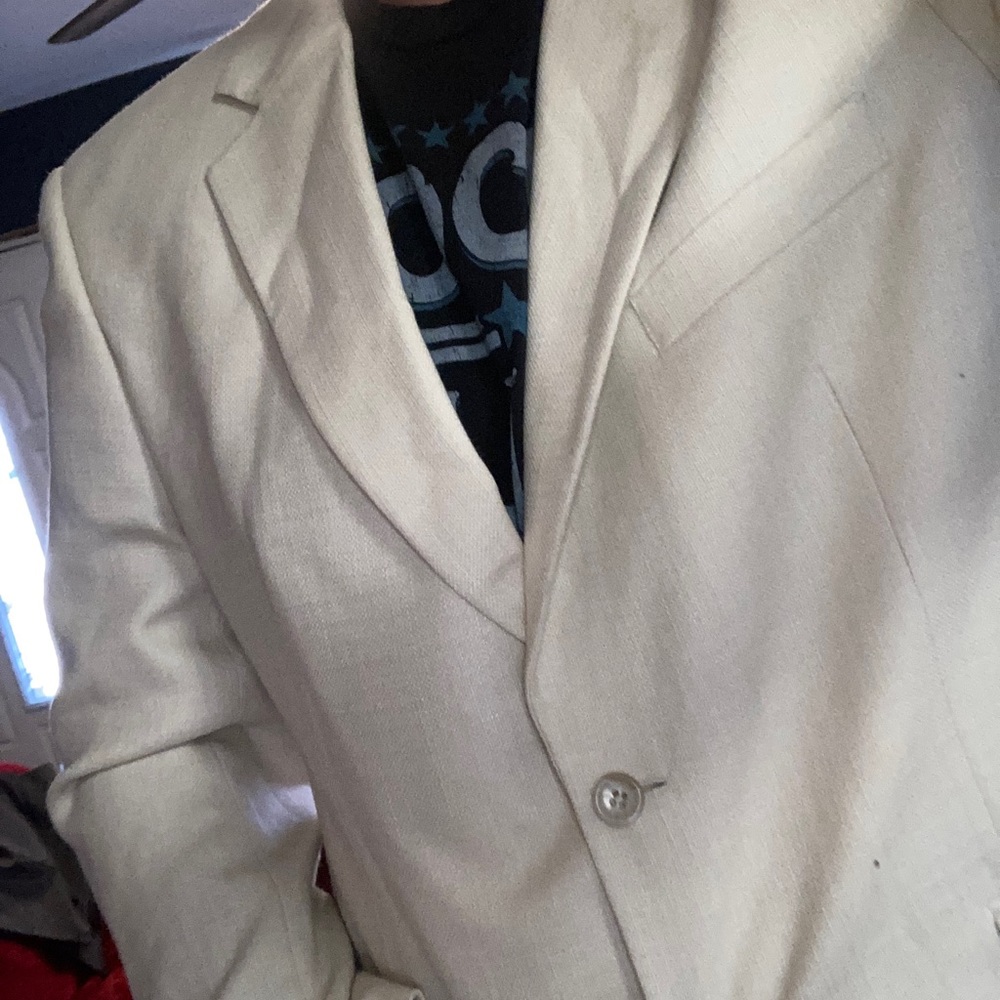White dress coat cream colored.  Nice